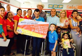 Entrega Oxxo $388 mil  a asociación Paso Firme