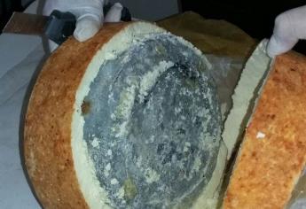 Policía federal localiza droga sintética entre piezas de queso