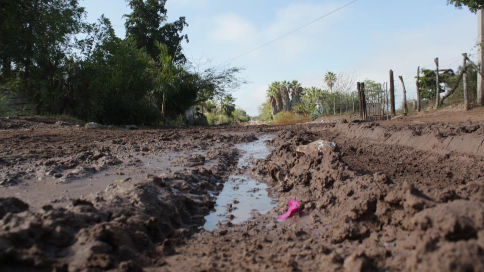 Lluvias empeoran la calle mini cero de Juan José Ríos