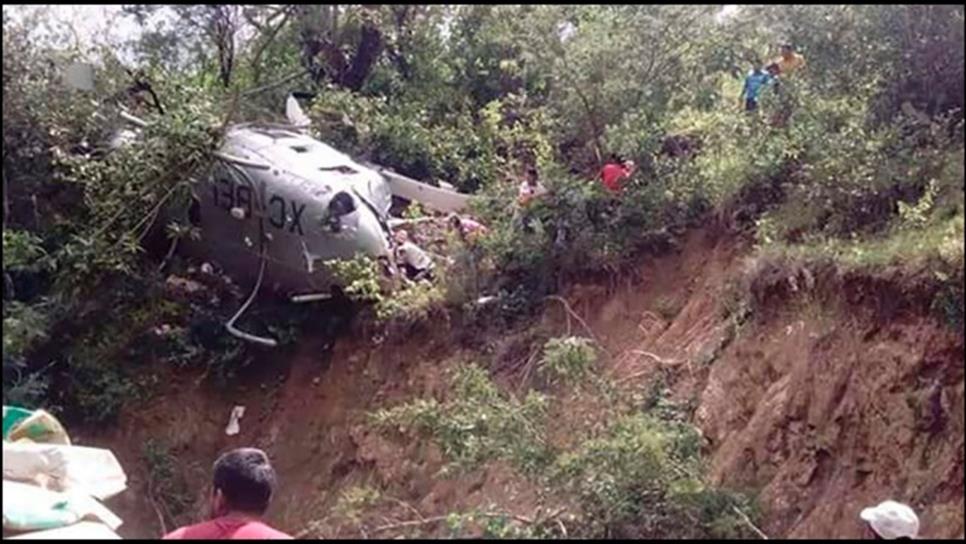 Se desploma helicóptero que llevaba despensas a Oaxaca