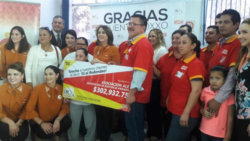 Asociación Ale recibe 302 mil pesos por redondeo de Oxxo