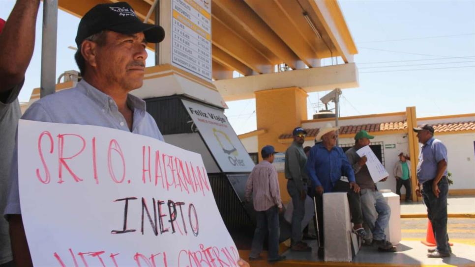 Productores toman caseta de San Miguel, exigen pago de frijol