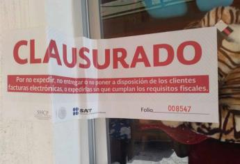 SAT coloca sellos de clausura a florería