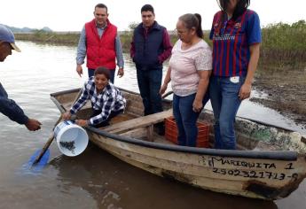 Siembran alevines en el dique Mariquita para promover turismo de pesca