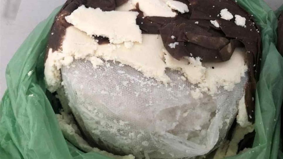 Aseguran en Tijuana casi 15 kg de cristal en queso enviado de Sinaloa