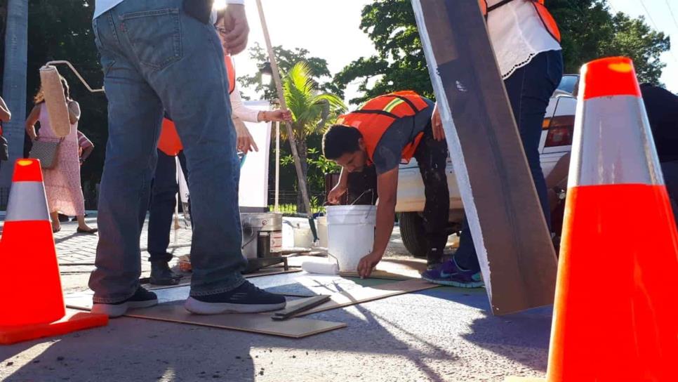 Asociaciones civiles causan polémica al repintar cruce peatonal