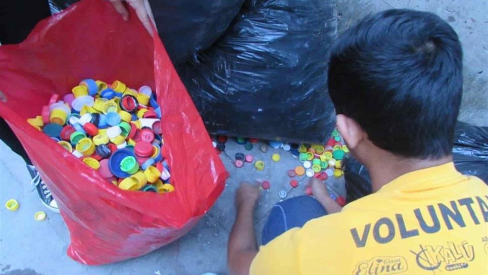 Una ayuda, Una Sonrisa invitan a donar tapitas de Plástico