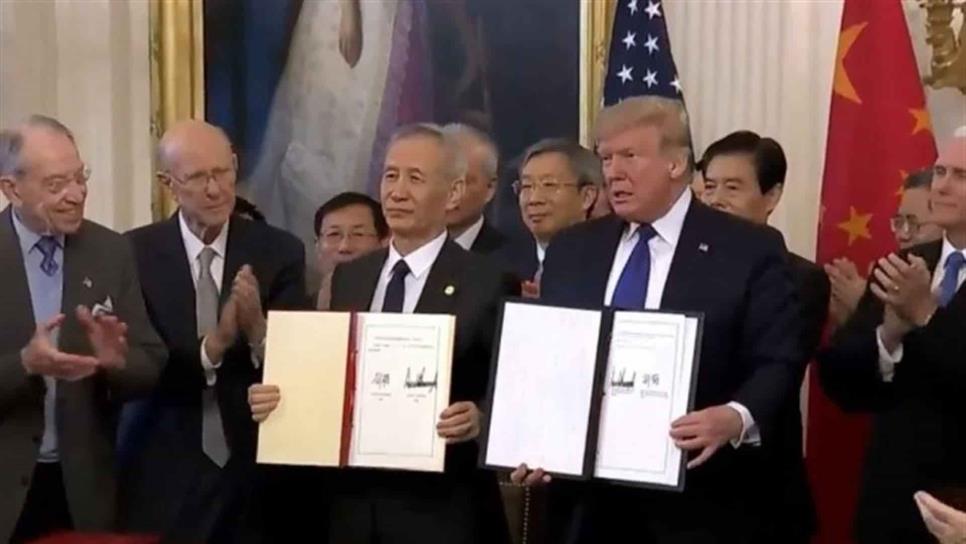 China y EUA firman primera fase del acuerdo comercial