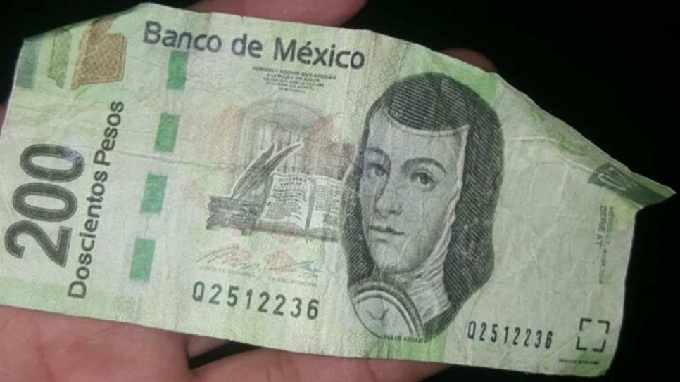 Por pagar con billetes falsos, detienen a mujer en Mazatlán