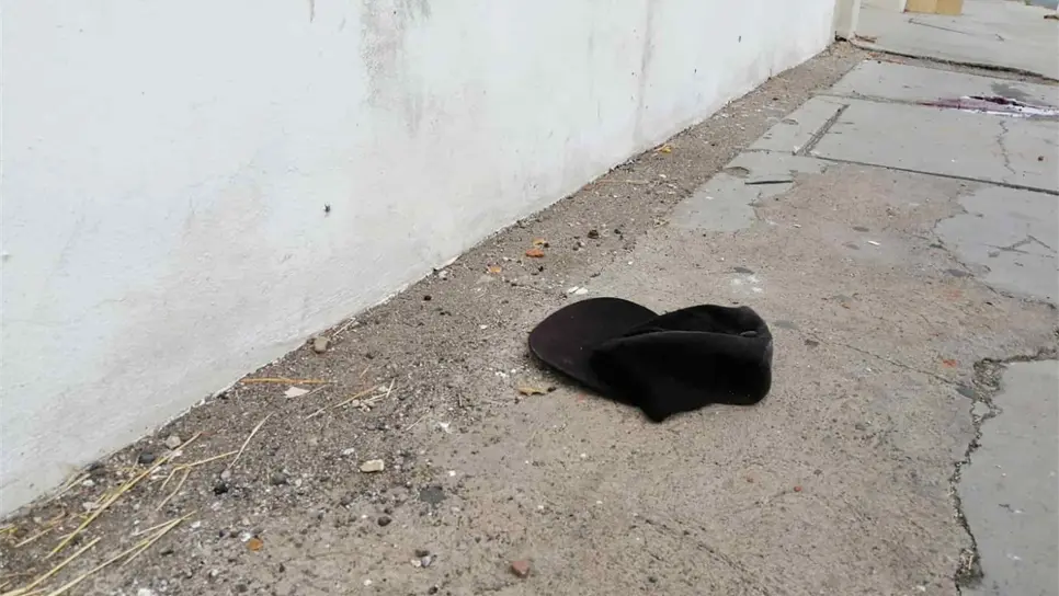 La gorra que portaba el lesionado.