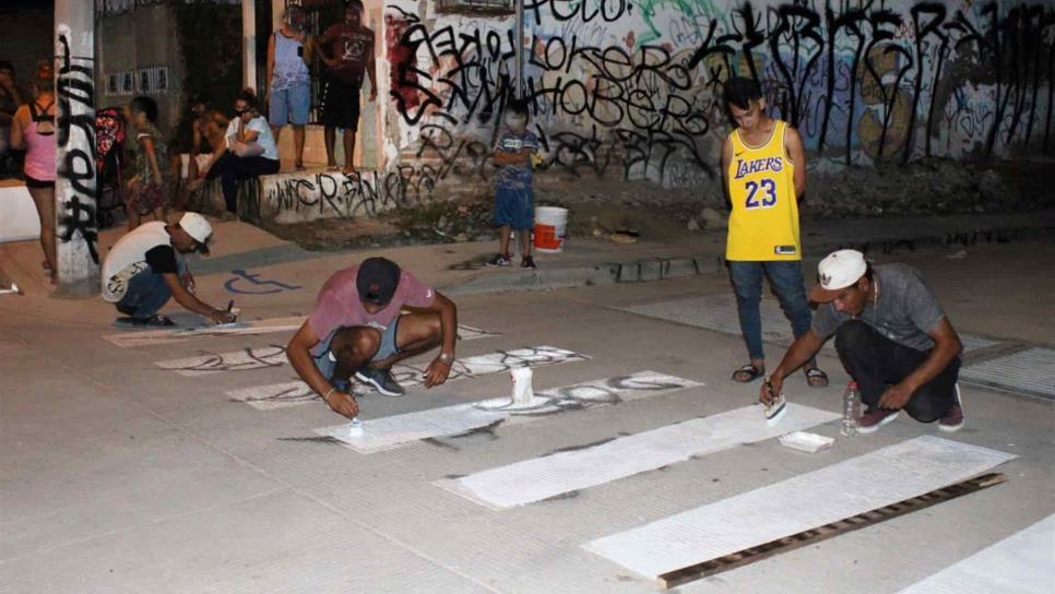 Aprehenden y multan a joven por grafiti en el malecón de los pobres