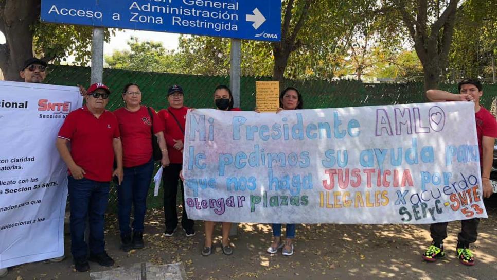 Llegada de AMLO desata manifestaciones en Culiacán