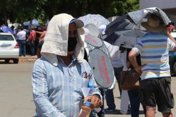 ¿Te dan calambres cuando andas en la calle? Puede ser síntoma de un golpe de calor