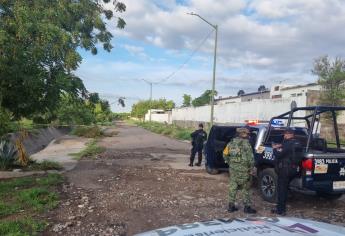 «Tiran» dos cuerpos amarrados y baleados en Colinas del Bosque en Culiacán