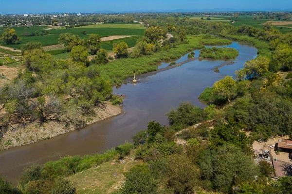Desazolvan río Sinaloa para evitar inundaciones 