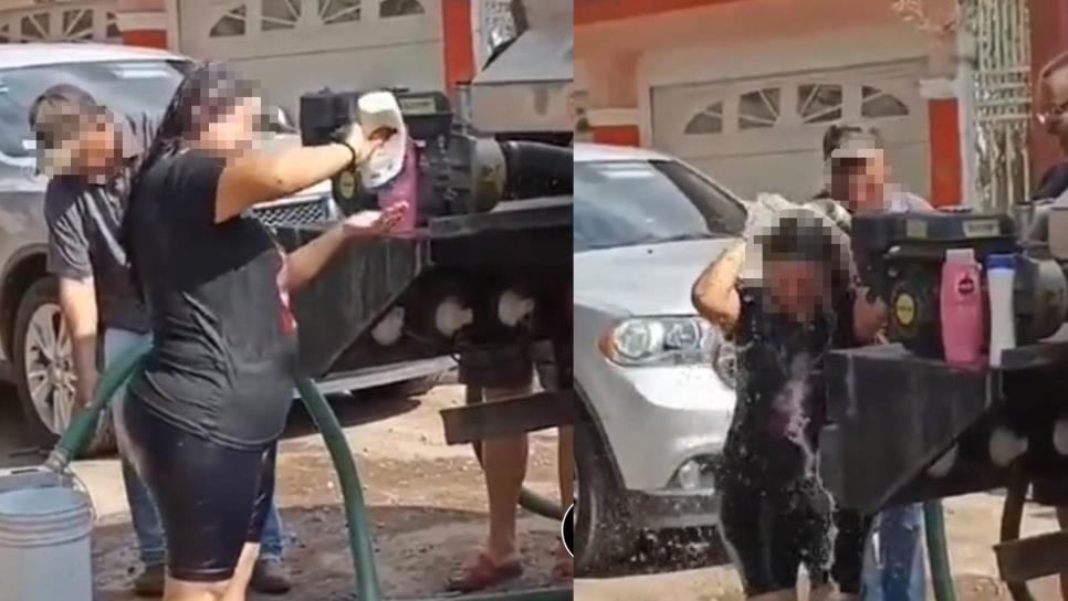 Con todo y champú, mujer se baña en pipas en Culiacán