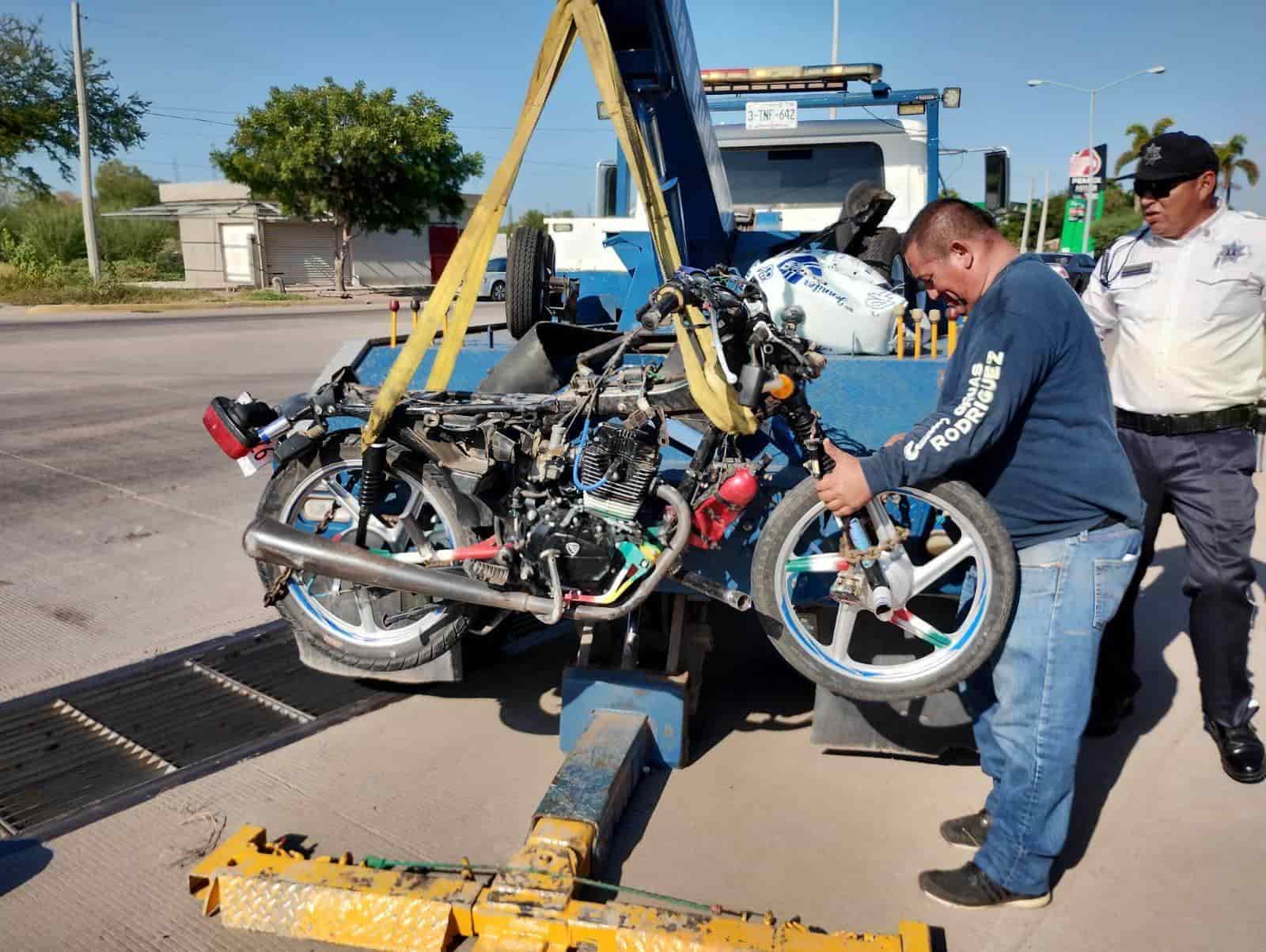 La moto donde viajaba el fallecido.