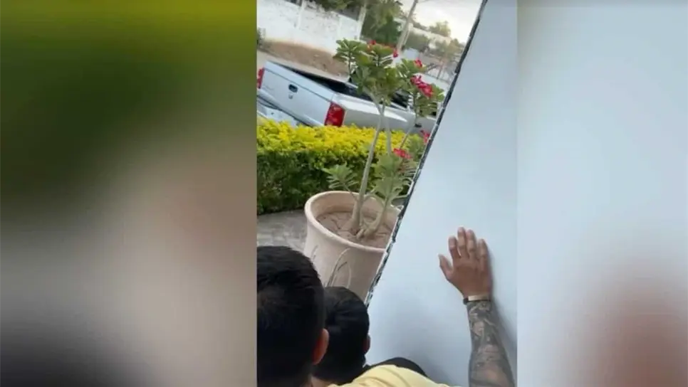 Los vecinos grabando la balacera.