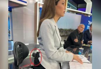 Conductora israeli da las noticias llevando consigo un arma de fuego