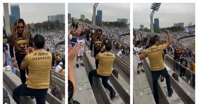 El aficionado al momento de pedirle a su pareja, la cual dijo que si.