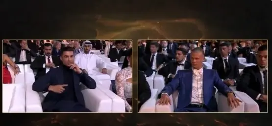 El jugador portugués señalando a Haaland como el ganador de la noche.