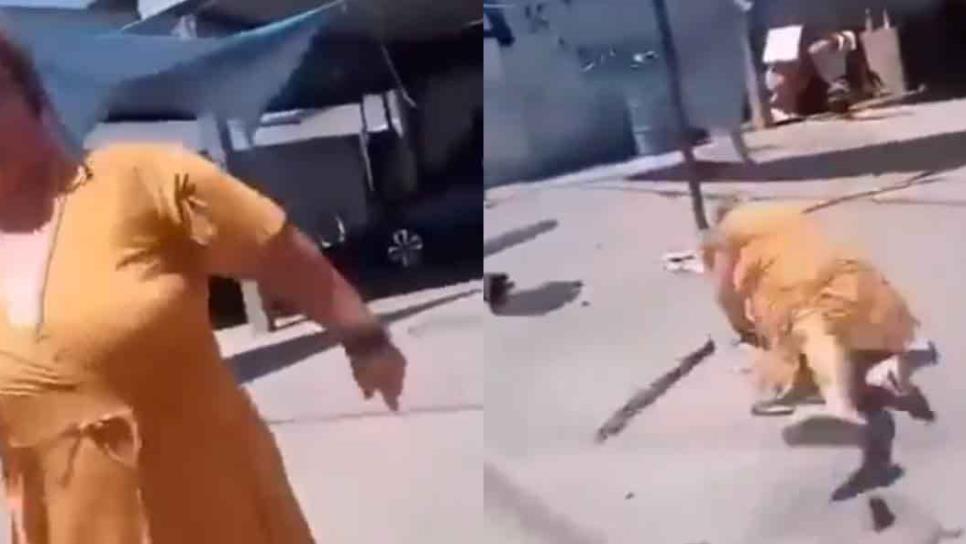 Mujer amenaza a trabajadores de la CFE con un machete y termina lesionada | VIDEO