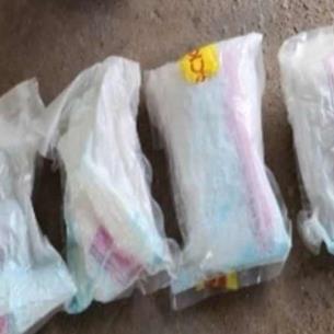 Autoridades  federales aseguran droga en una paquetería de Culiacán