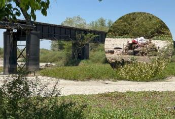 Construyen casa en medio del río seco y bajo el Puente Negro en Culiacán