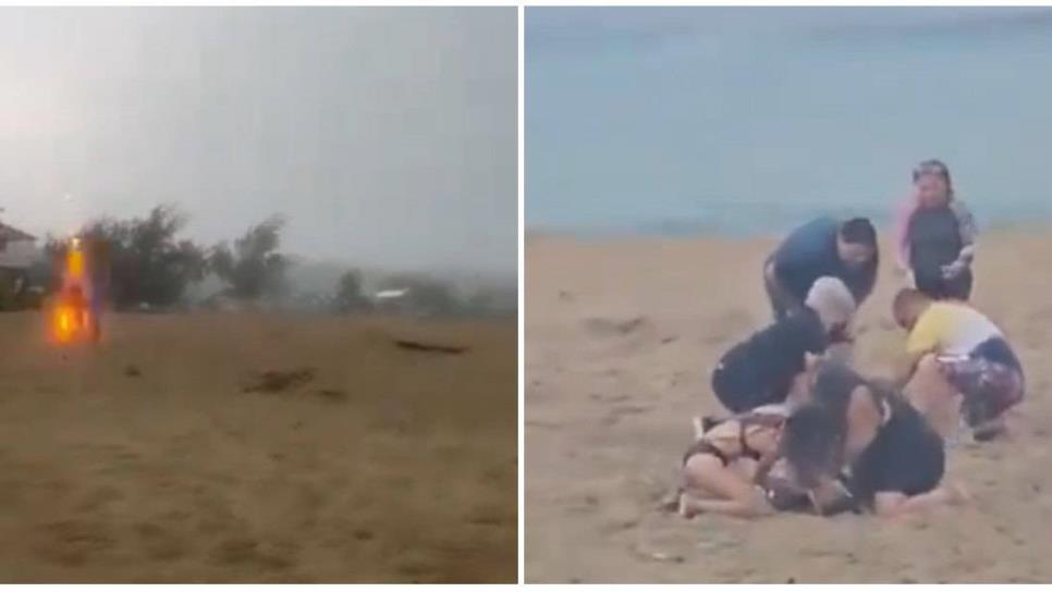 Rayo alcanza a tres niños que jugaban durante una tormenta eléctrica en la playa | VIDEO
