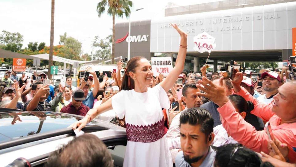 Al ritmo de la tambora reciben a Claudia Sheinbaum en el Aeropuerto de Culiacán