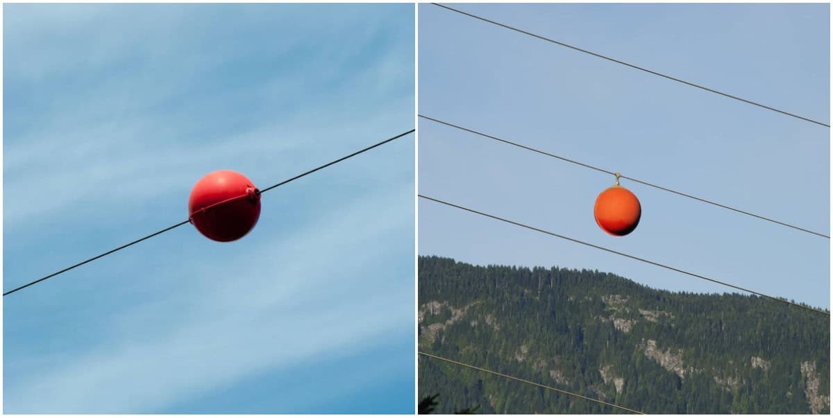FOTO: Bolas rojas en los cables de alta tensión.