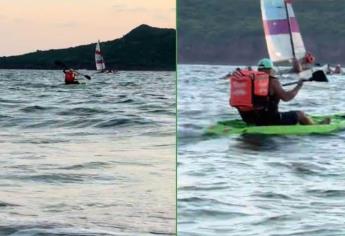 ¿A cualquier rincón? Se viraliza repartidor de plataforma que en kayak llevaba pedido por playas de Mazatlán 