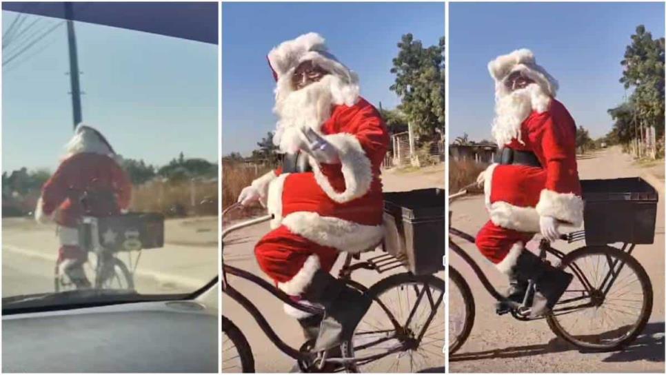 ¡Santa Claus en bicicleta por las calles de Navolato! Se dirigía a un kinder para llevar juguetes | VIDEO