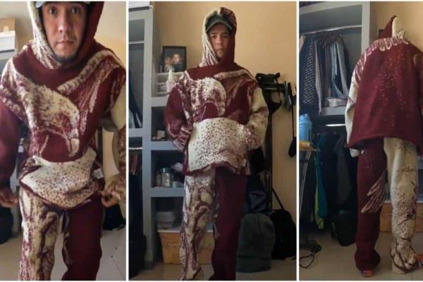 Joven convierte cobija de tigre en traje de saco y pantalón para evitar el frío