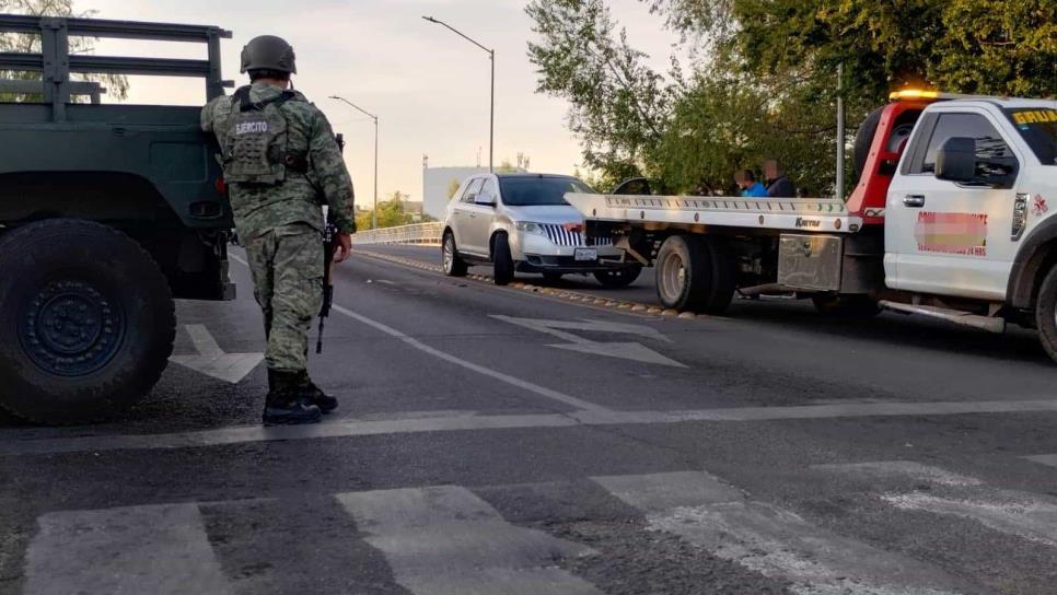 Disparan e intentan despojar una camioneta en Las Quintas, Culiacán