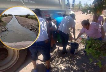 Escasez de agua obliga a familias del ejido 18 de Marzo a recurrir al canal y garrafones