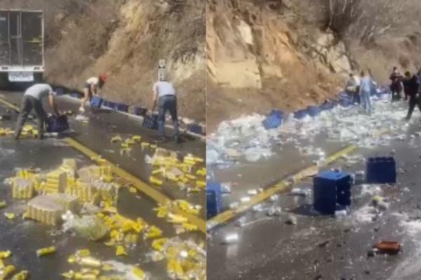 ¡Se le ladea la carga! Volcadura de tráiler con cerveza provoca caos vial y rapiña en la carretera Malpica-Concordia