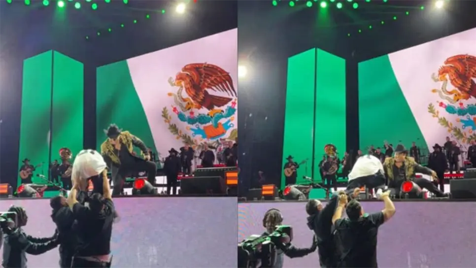 Julión tuvo una divertida caída que no pasó a mayores, la cual le arrancó la sonrisa, mientras que Santa Fe Klan lo ayudaba a pararse