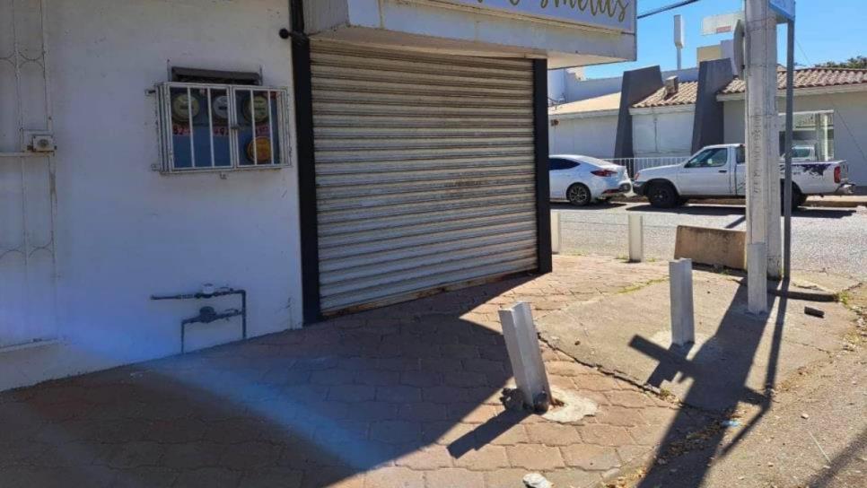 Comerciantes cierran locales tras reporte de personas armadas en Villa Juárez, Navolato Comerciantes cierran locales tras reporte de personas armadas en Villa Juárez, Navolato