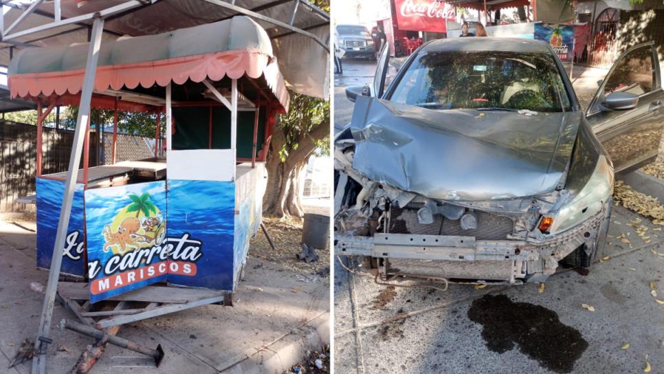 Conductor a exceso de velocidad choca contra un vehículo y dos carretas comerciales en Los Mochis Conductor a exceso de velocidad choca contra un vehículo y dos carretas comerciales en Los Mochis