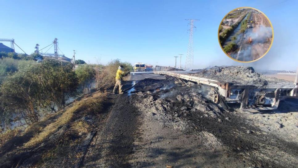 Chispa de basura ardiendo junto al lateral 18 incendia remolque cargado de pacas de alimento para ganado Chispa de basura ardiendo junto al lateral 18 incendia remolque cargado de pacas de alimento para ganado