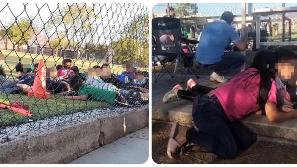 Niños se tiran pechotierra en campo deportivo para salvarse de la balacera en El Ranchito, Culiacán Niños se tiran pechotierra en campo deportivo para salvarse de la balacera en El Ranchito, Culiacán