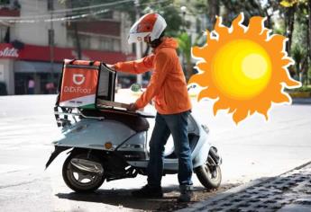 En Culiacán motociclistas de comida rápida así comienzan a protegerse del sol