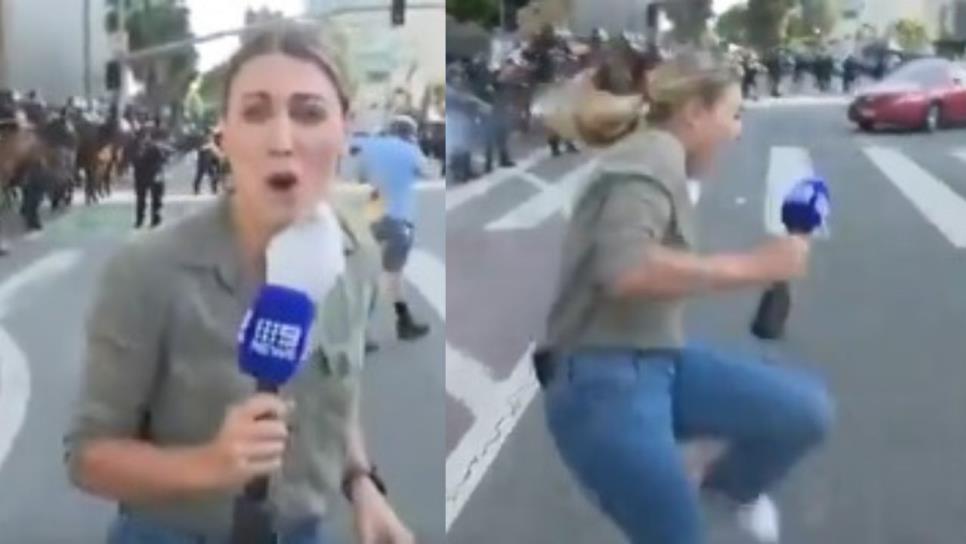 Momento exacto en que policía dispara a reportera en disturbios de migrantes en EU | VIDEO Momento exacto en que policía dispara a reportera en disturbios de migrantes en EU | VIDEO
