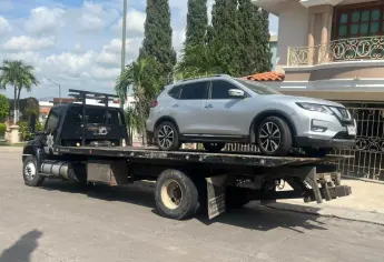 Aseguran dos casas, vehículos, armas y dinero en efectivo en Colinas del Rey de Culiacán