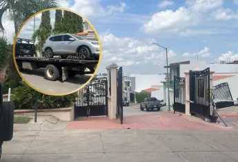 Aseguran dos casas, vehículos, armas y dinero en efectivo en Colinas del Rey de Culiacán