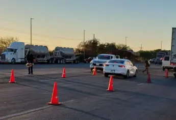 FGR detiene a tres sujetos en Guasave con 18 millones de pesos y armas sin licencia