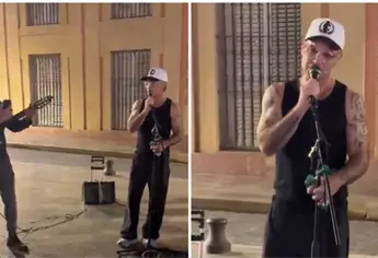 Robbie Williams sorprende al cantar Angels junto a un músico callejero | VIDEO